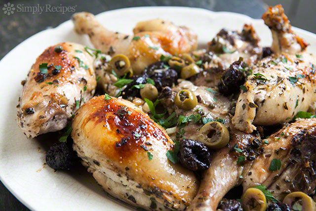 Chicken marbella on a white plate