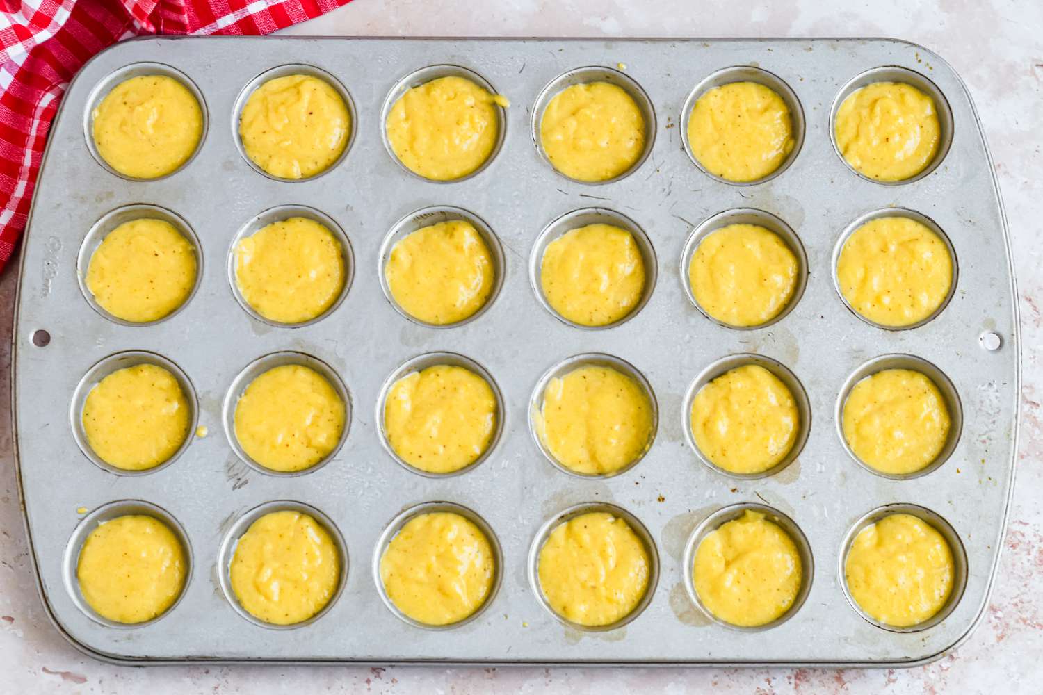 Batter Evenly Distributed in the Muffin Tin 
