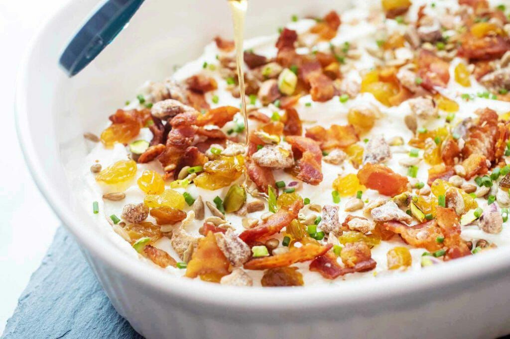 Drizzle honey over top of goat cheese 7-layer dip