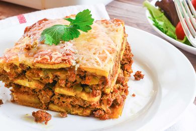 A slice of Pastelon Puerto Rican Plantain Lasagna on a plate