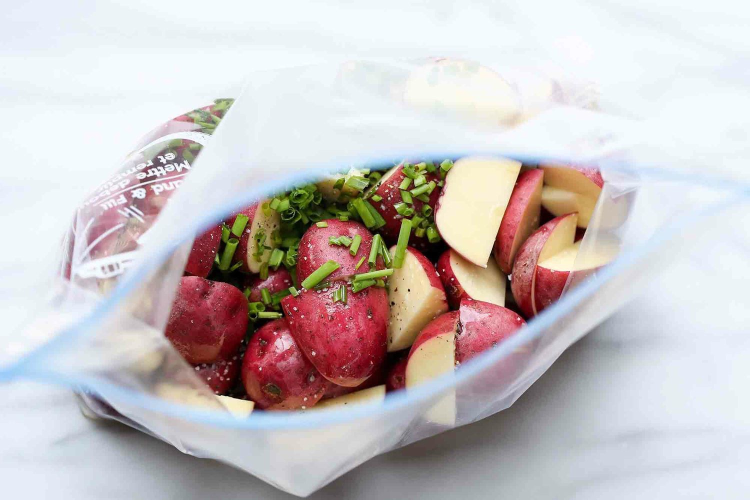 Sous Vide Potatoes Recipe prep the bag with herbs and potatoes
