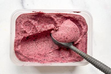 Frozen yogurt in a clear tub