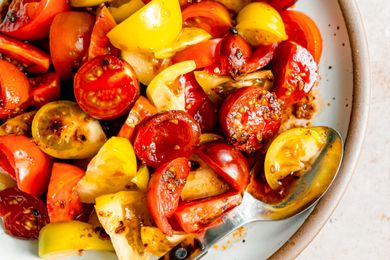 5-ingredient chili crisp tomato salad on a plate (close-up)