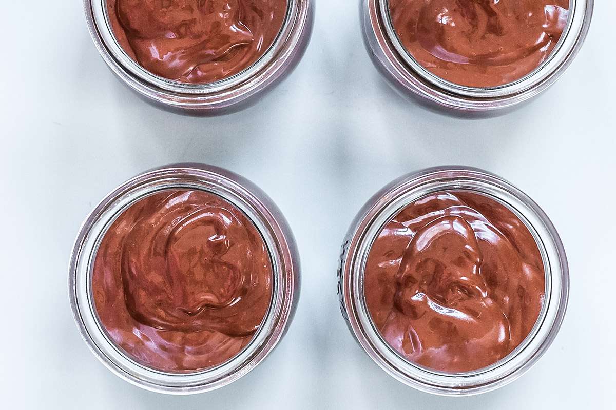 Four servings of homemade chocolate pudding.