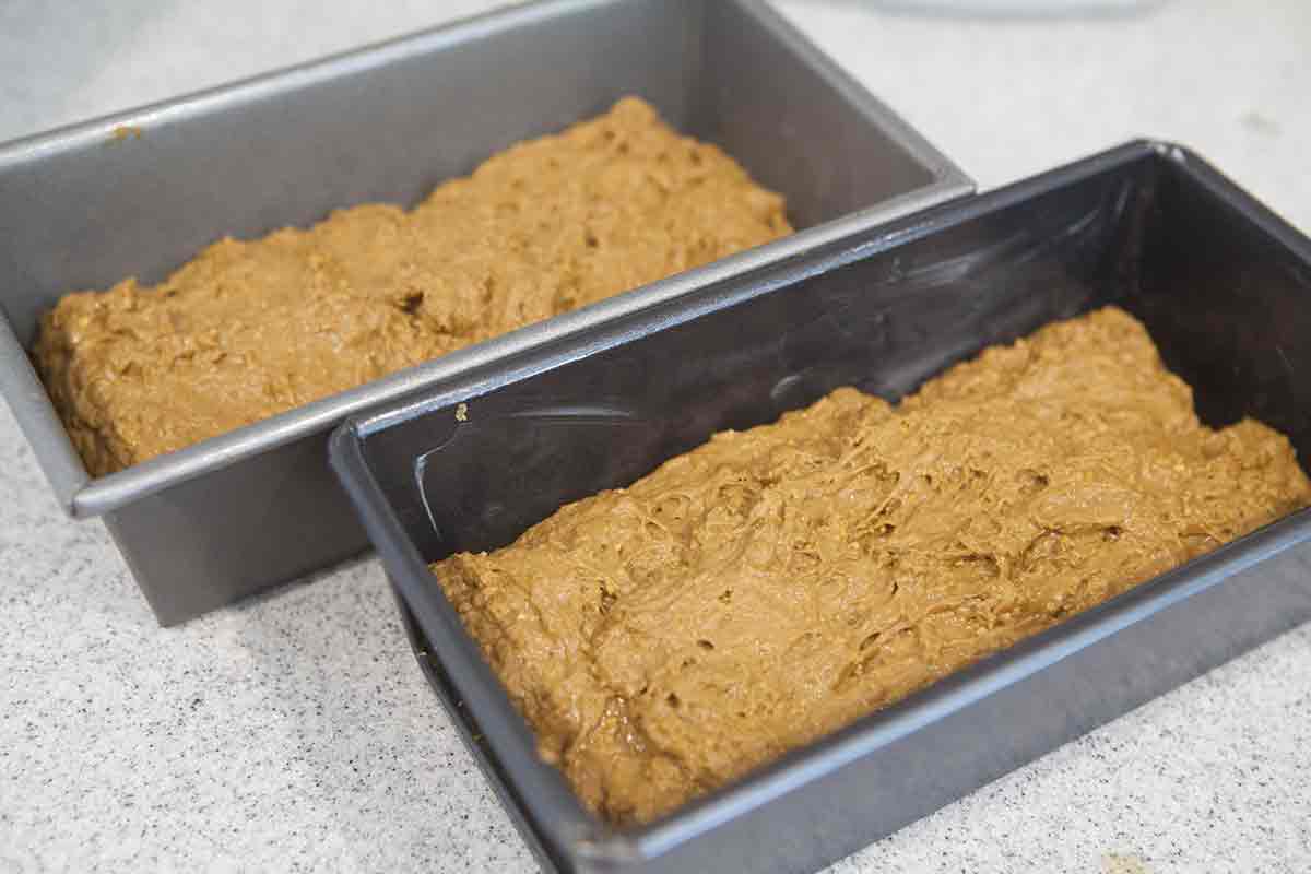 anadama bread dough in loaf pans