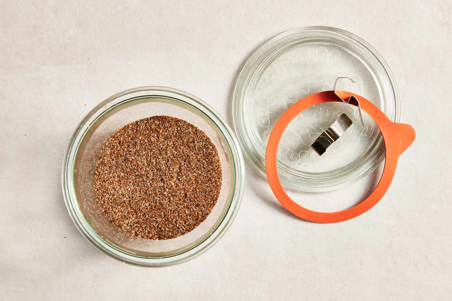 Fajita Seasoning in a Jar and a Jar Lid on the Counter