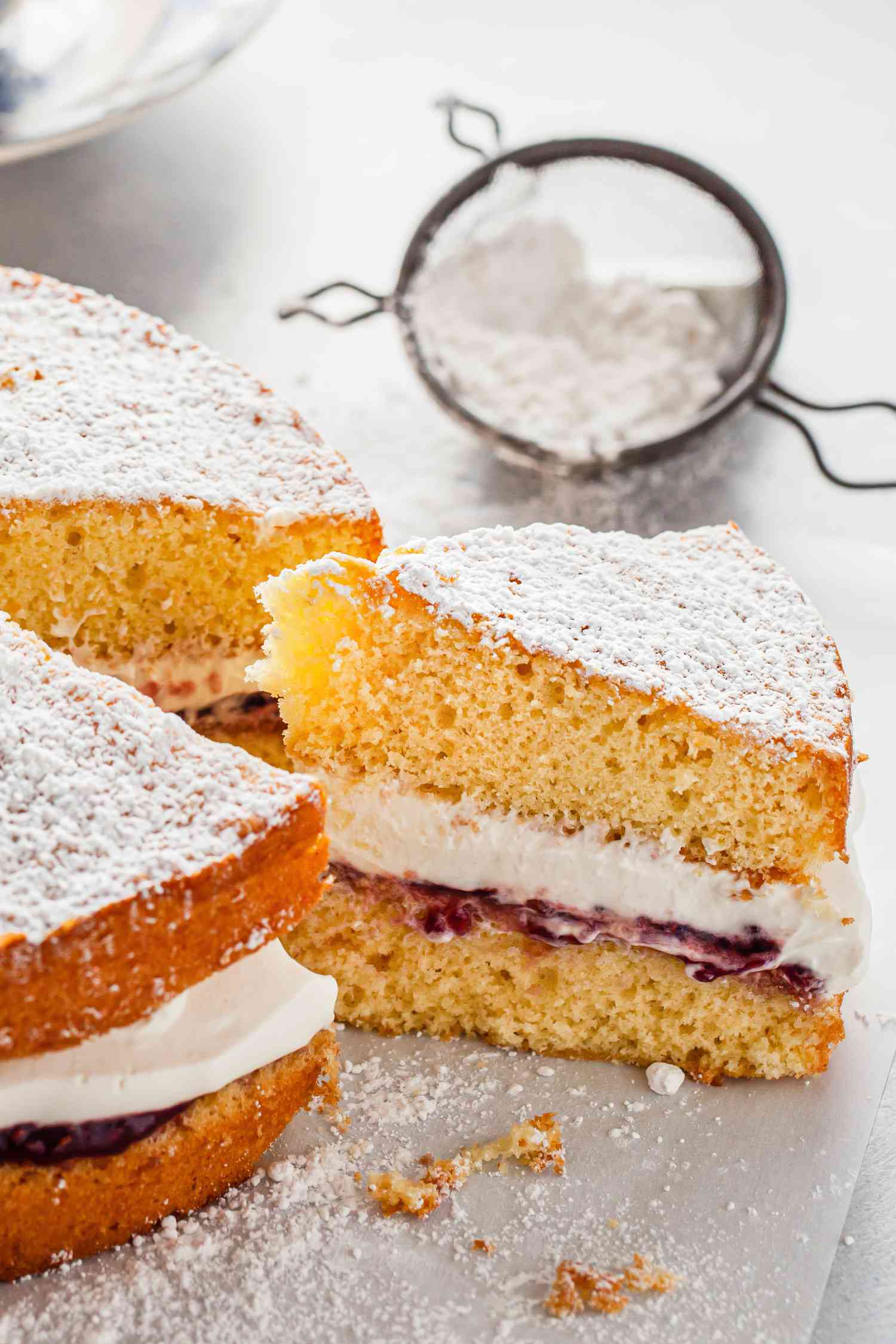 Victoria Sponge Cake with a Slice Cut Out