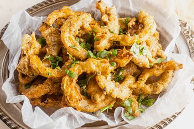 Platter of Delicata Squash Pakoras Topped with Chopped Cilantro 