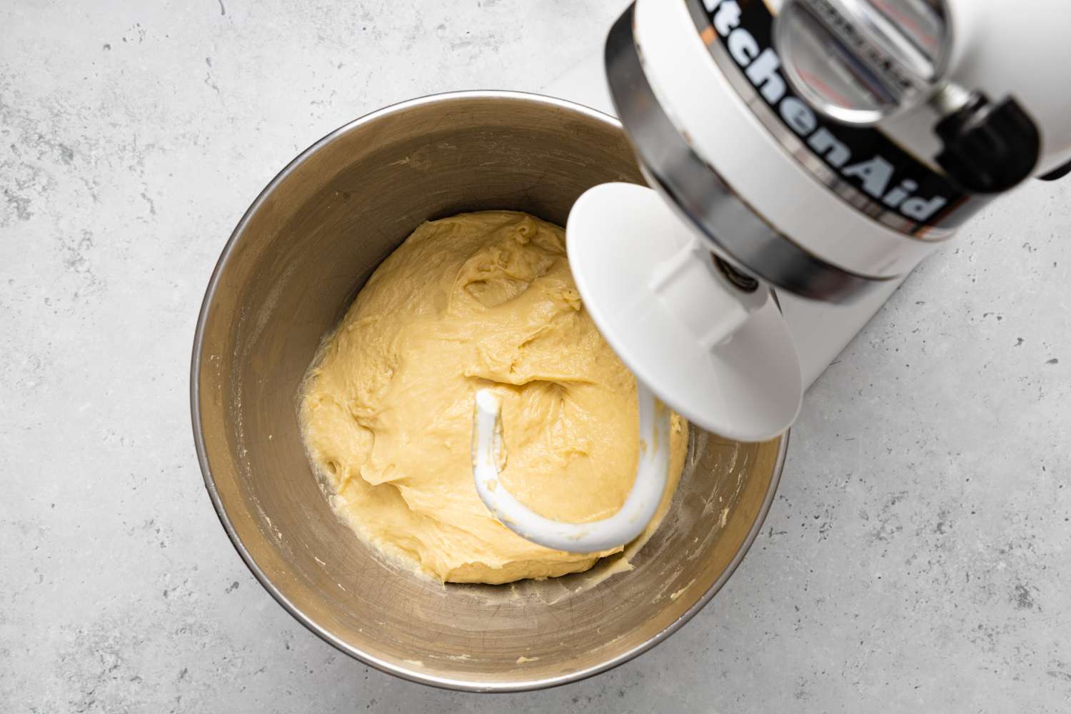 Donut Dough in a Stand Mixer Bowl, All Dough Removed from Dough Hook