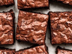 Brownies on a piece of parchment paper