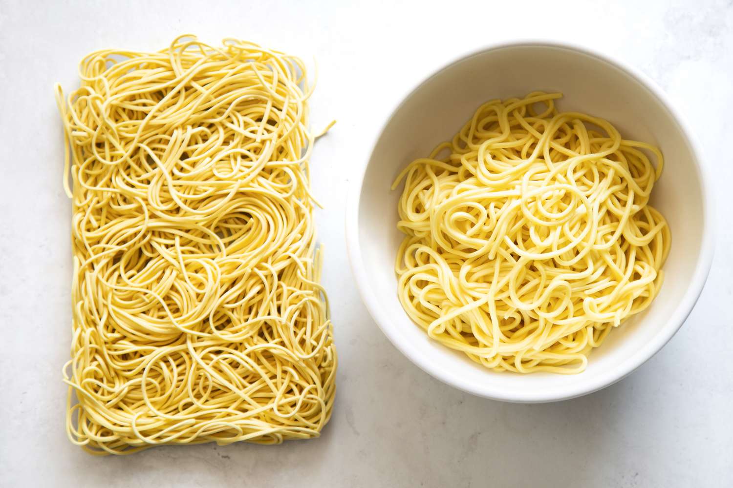 Dried Chow Mein on the Left and Cooked Chow Mein in a Bowl on the Right