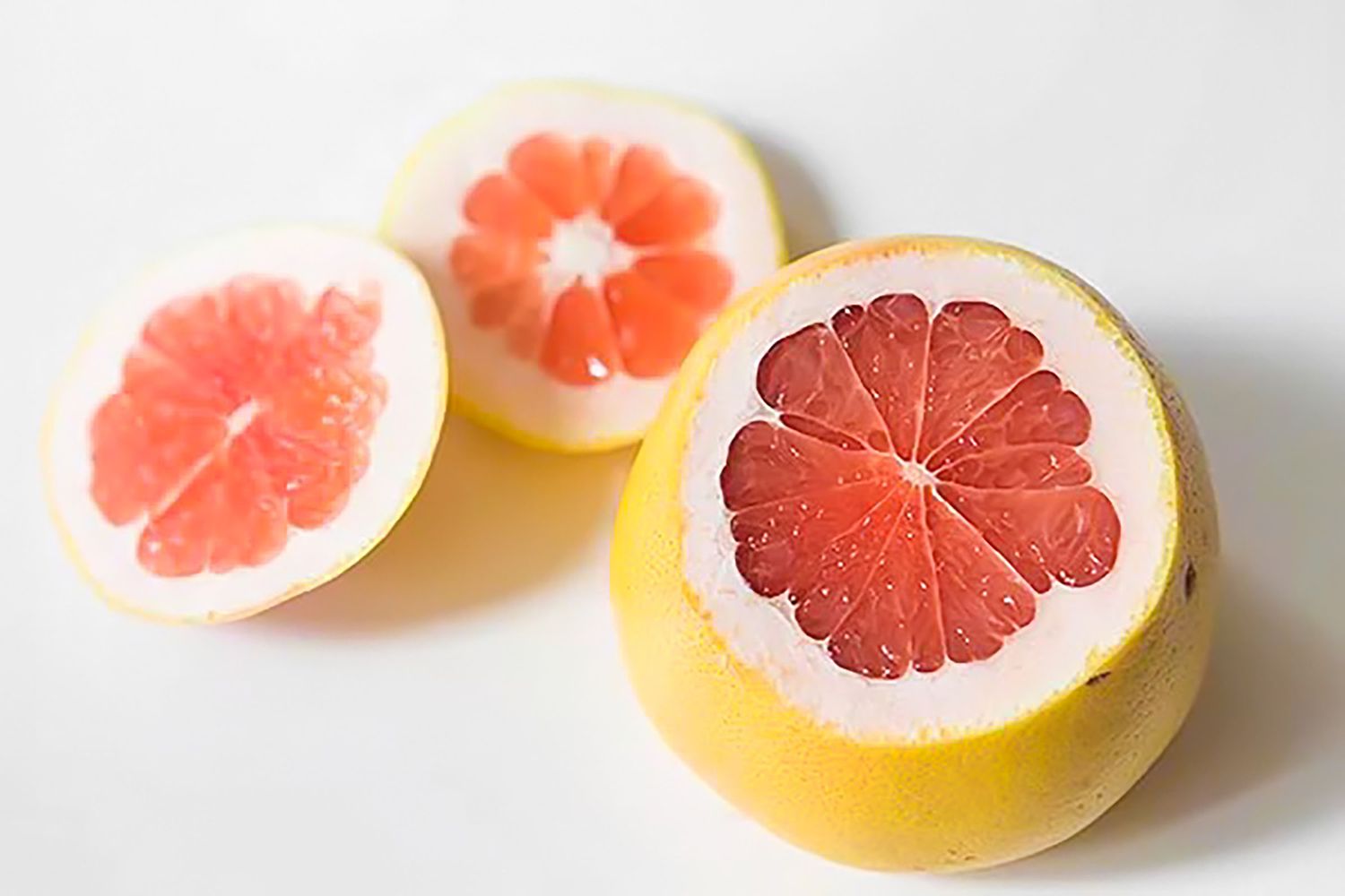 Citrus Fruit with the Pole Ends Cut Off and on the Counter in the Background