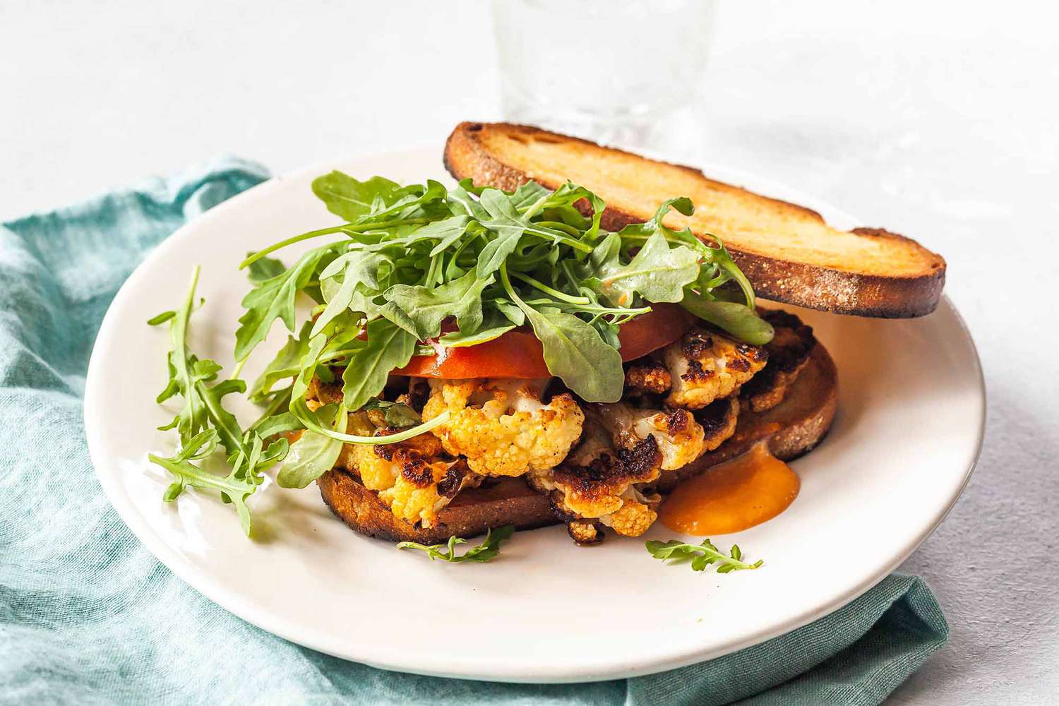 Easy Cauliflower Steak Sandwich arugula