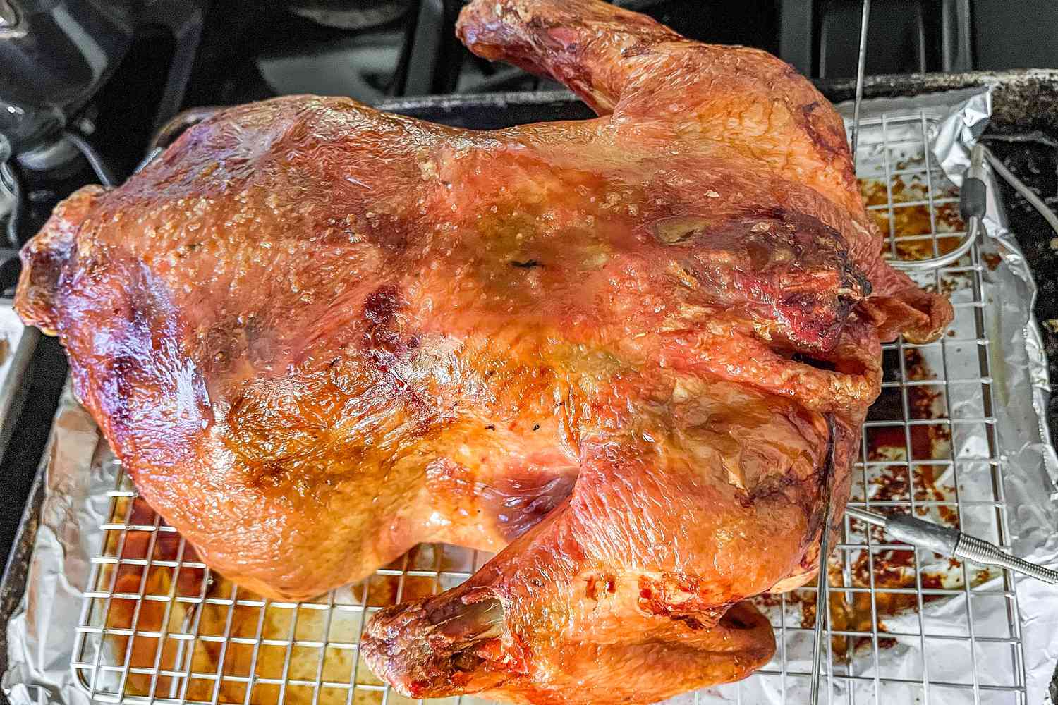 Baked turkey on a roasting pan, breast side down