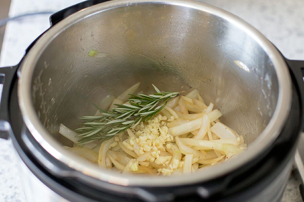 Cooked onions, rosemary and broth for instant pot pot roast