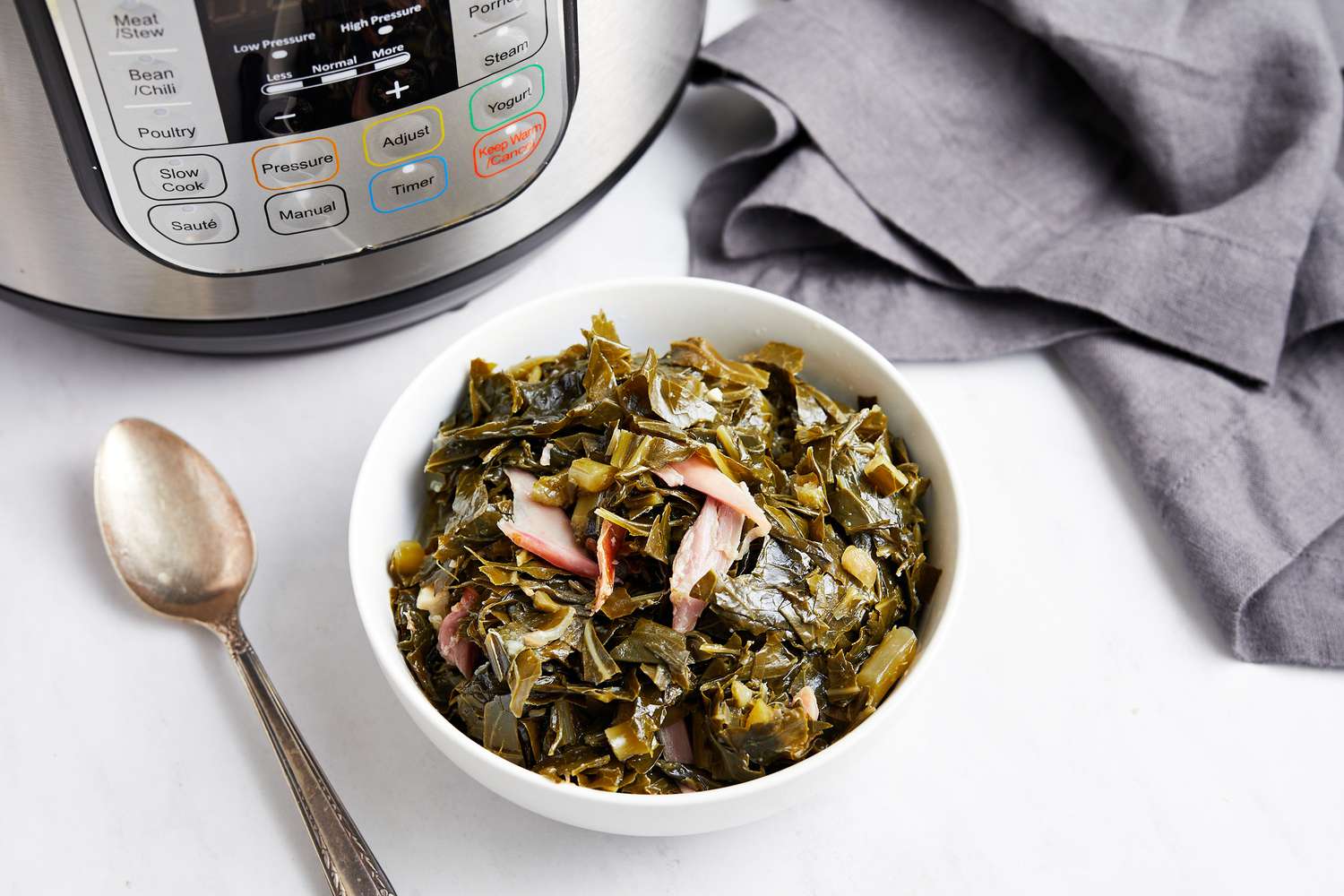 Bowl of Collard Greens Next to an Instant Pot 