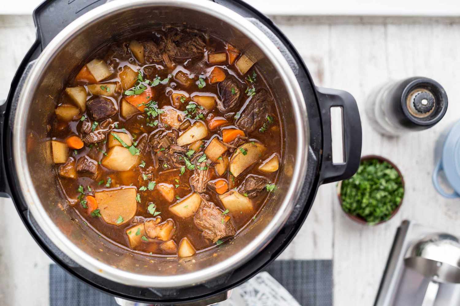 Overhead view of an open Instant Pot filled with cooked Irish beef stew