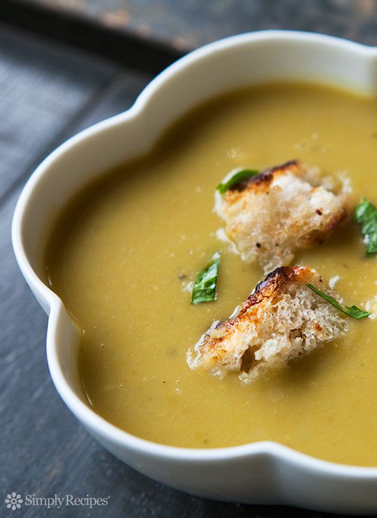 Split pea soup with ham hock and topped with croutons.