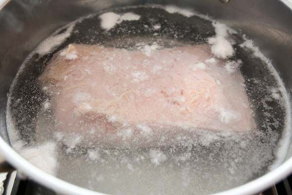 Boiled corn beef in large stock pot