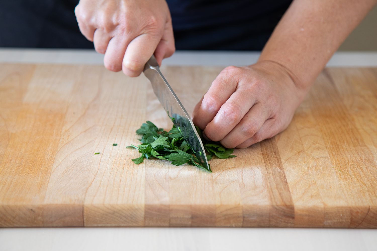Chopping a pile of parsley