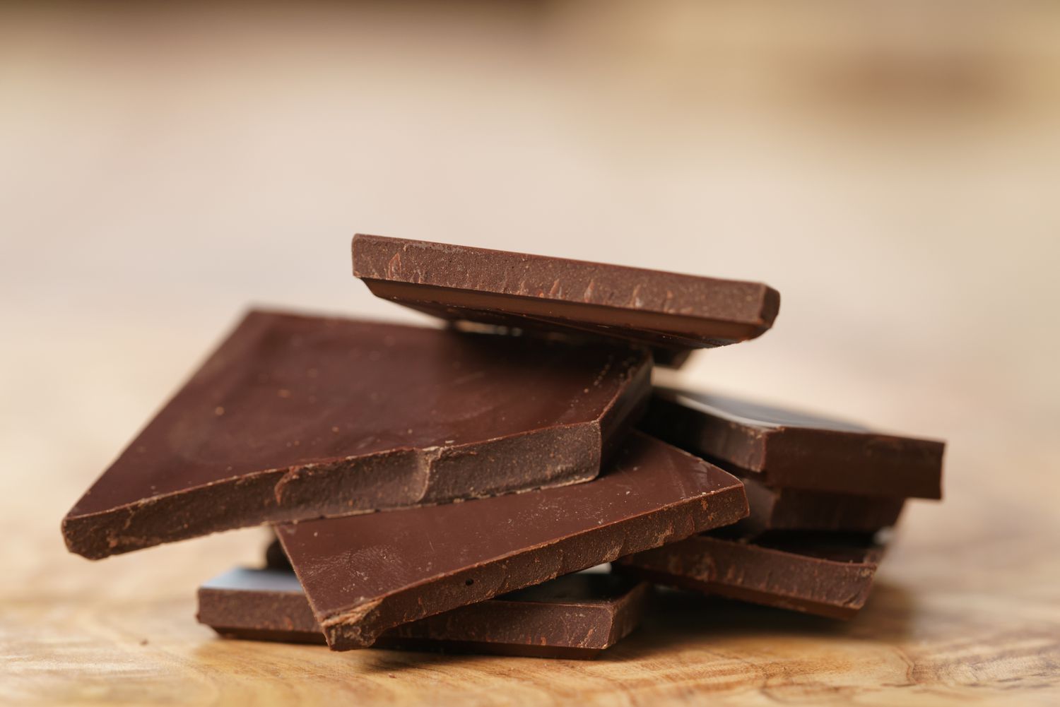 Stacked pieces of a broken-up chocolate bar