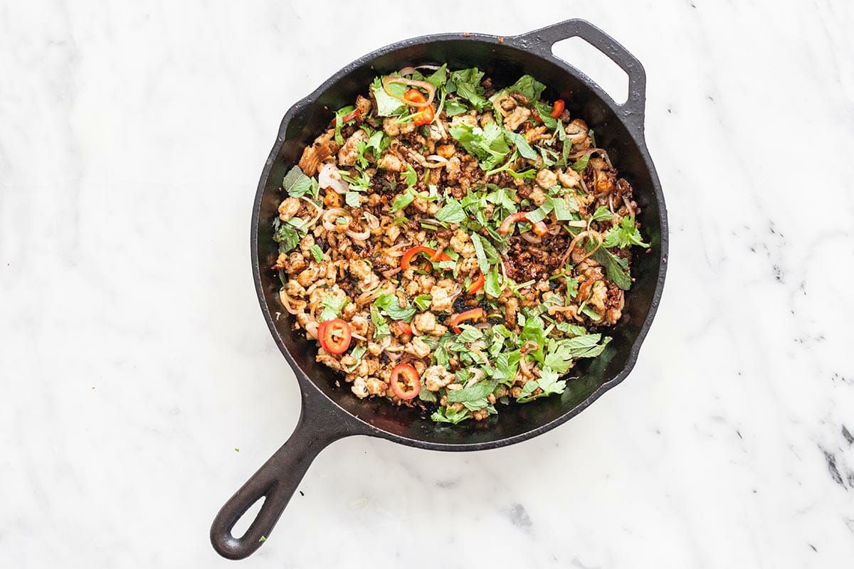 Chicken Laab Recipe add the cilantro and chili