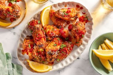 Chicken wings on a white platter