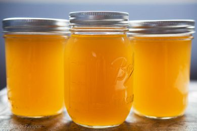 Three canning jars of cooking stock