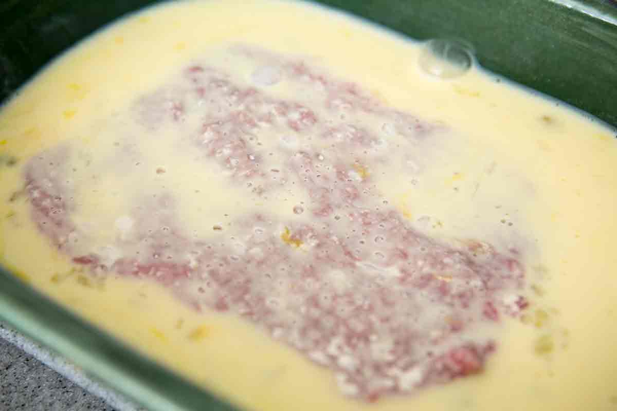 Chicken fried steak dredged in flour and egg