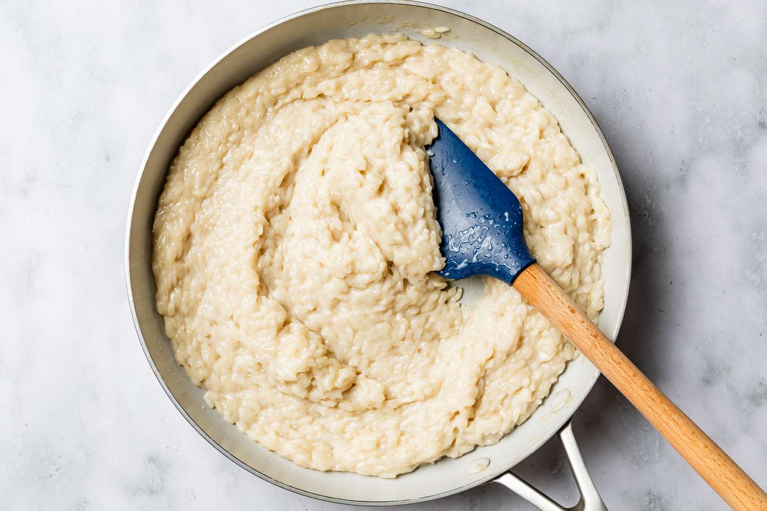 biko cooked in a pan until porridge texture for biko (Filipino sticky rice cake) recipe