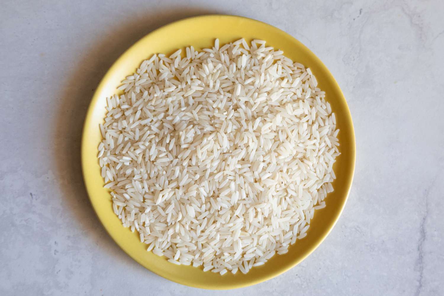 Basmati rice on a yellow plate
