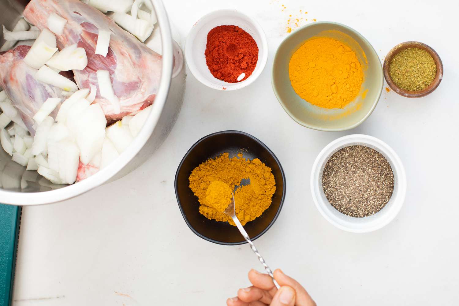 Spices and Lamb Chop Kabuli Palao (Afghan Lamb Shanks with Rice, Carrots, and Raisins)