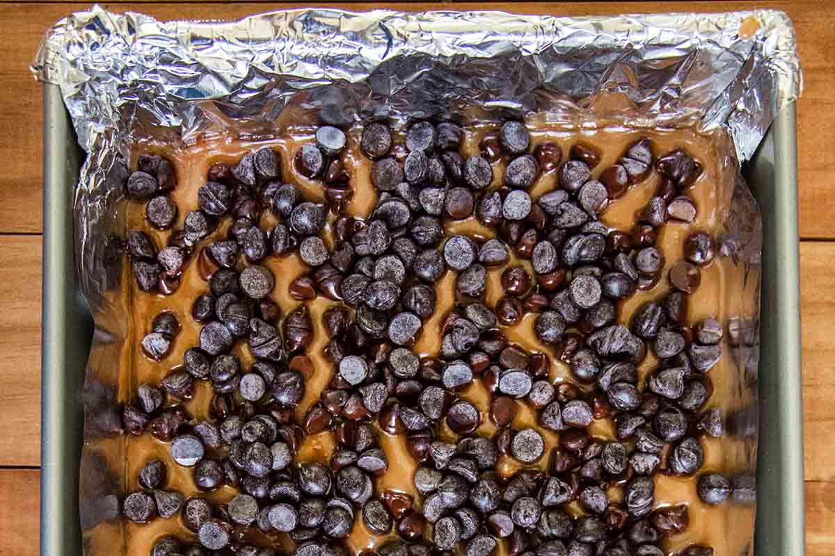Making toffee chocolate by melting chocolate on top.