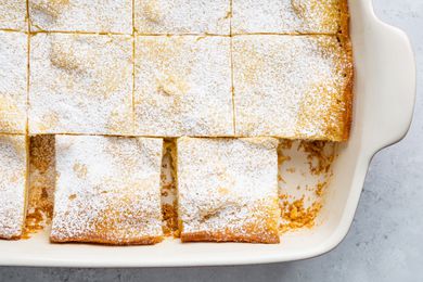 Gooey Butter Cake Cut into Pieces in a Baking Pan