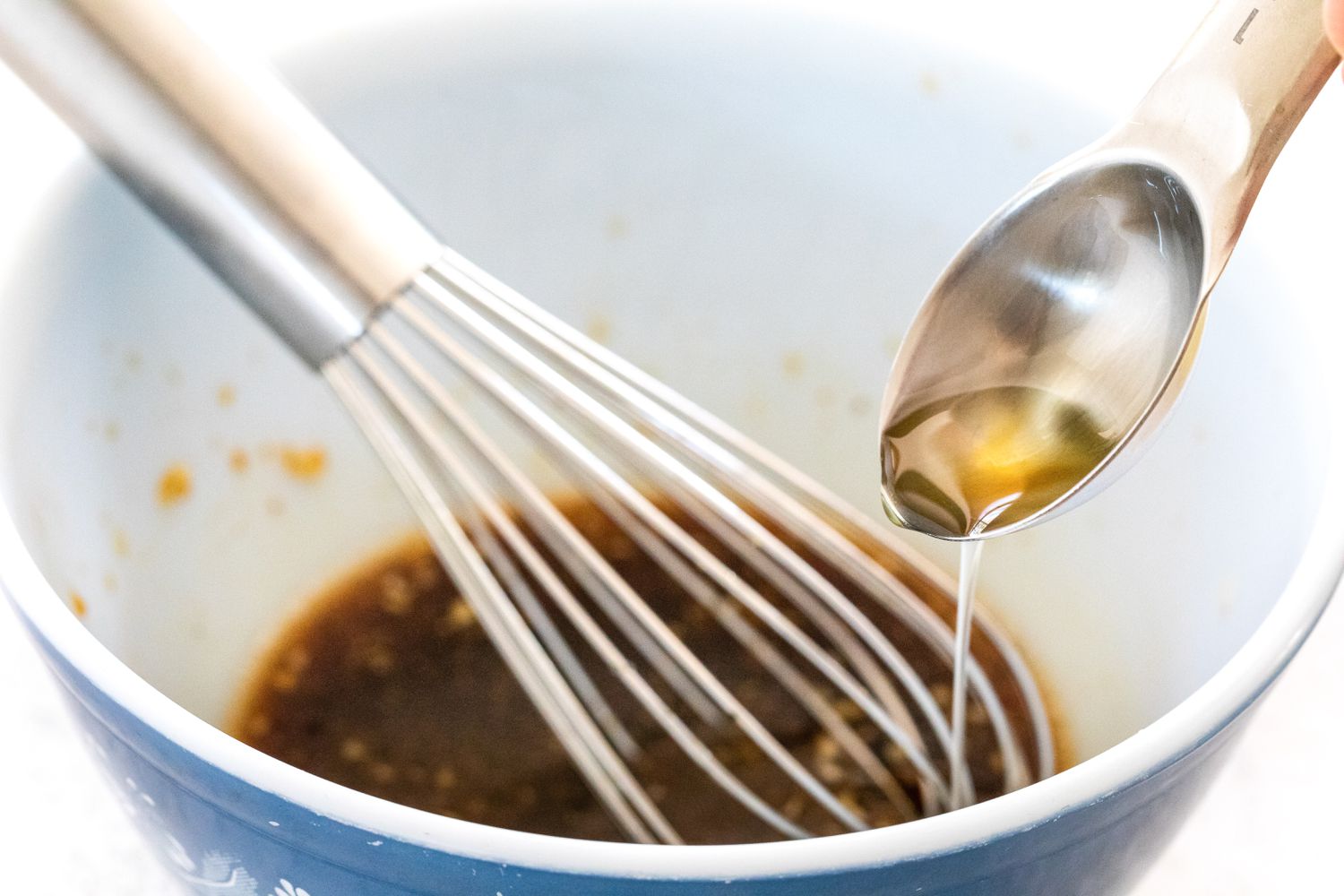 Whisk in oil.