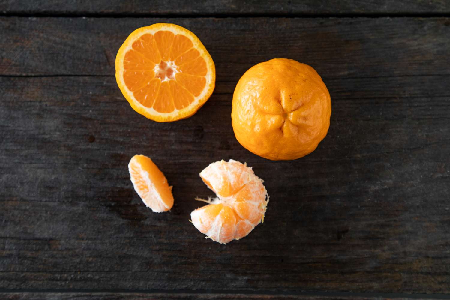 Satsuma mandarin on dark background