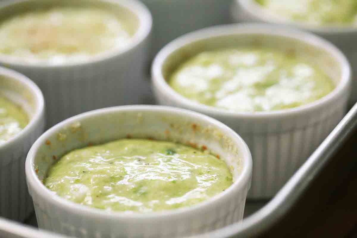 asparagus souffle in ramekins about to go into oven
