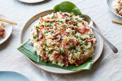 Vietnamese steamed rice served over banana leaves.