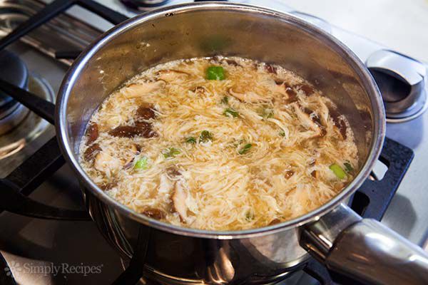 Egg Drop Soup Recipe Simmering On a Stove 