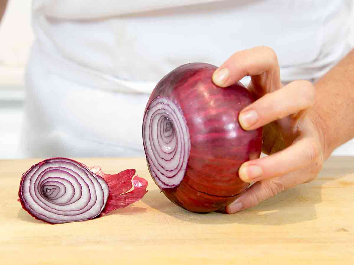 Slice the stem end of the onion off