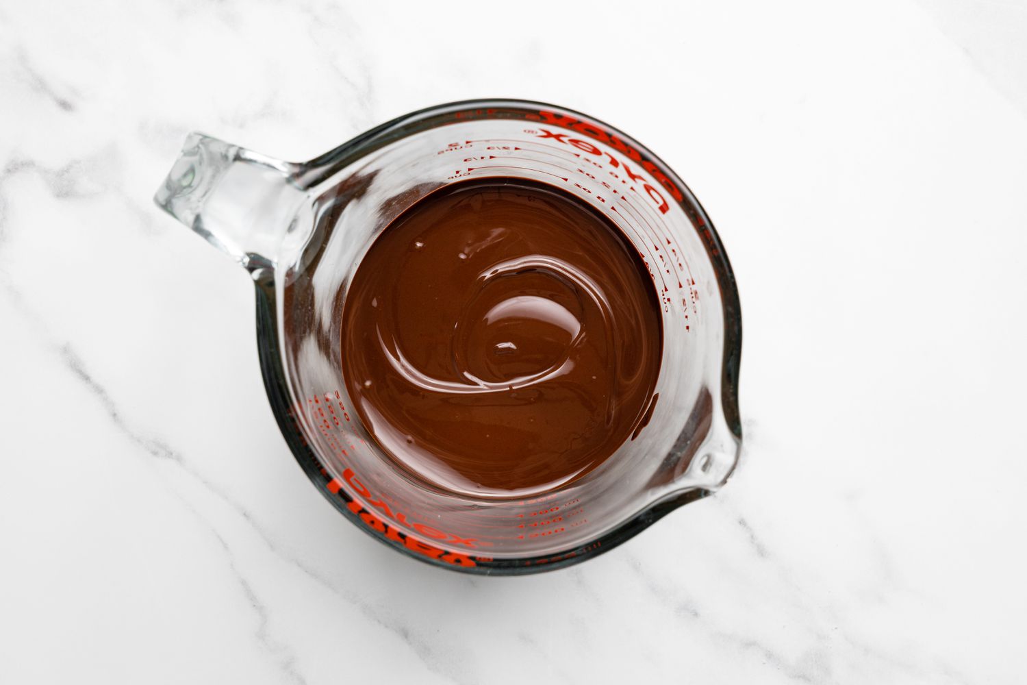 Measuring Cup with Melted Chocolate