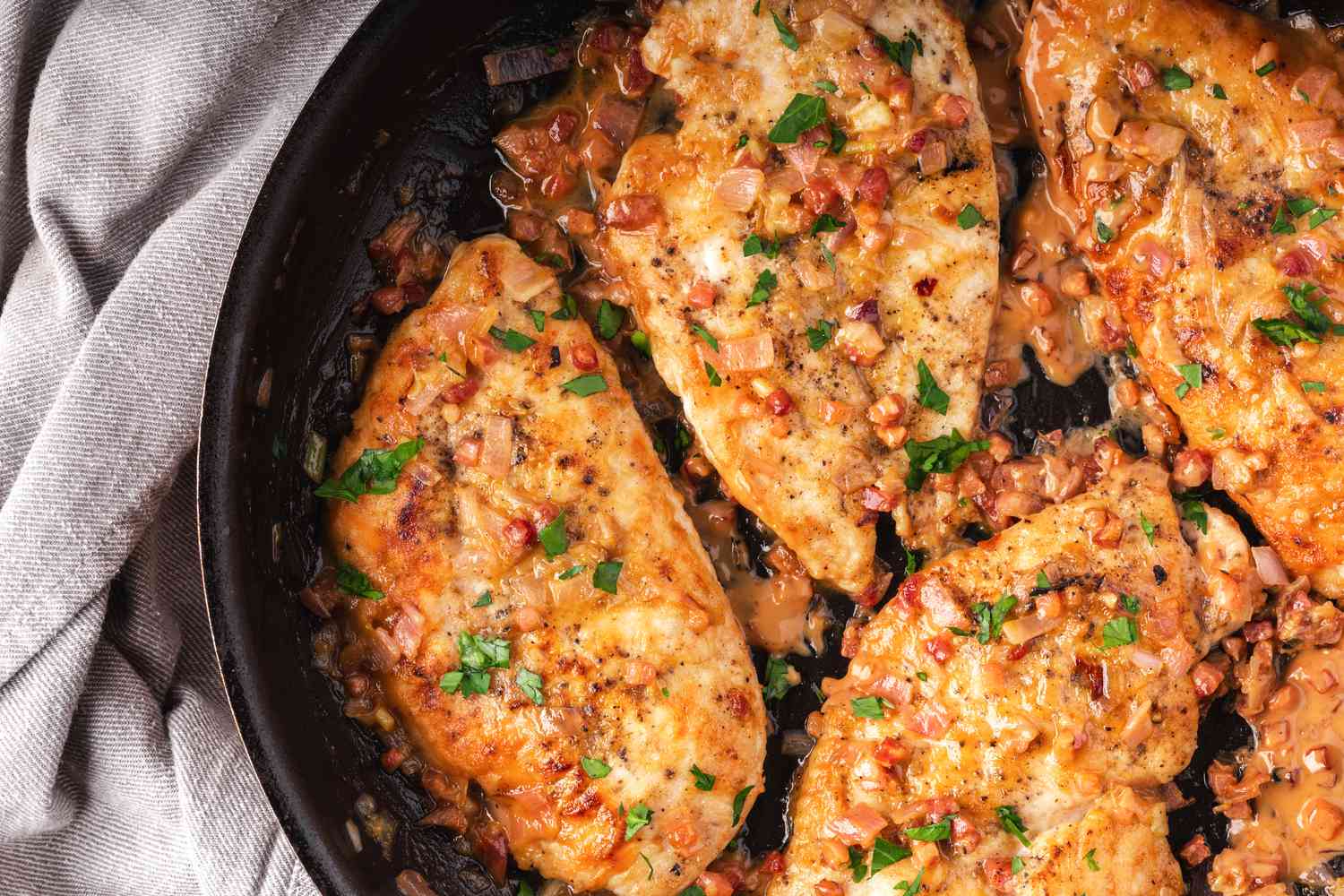 Overhead view of a skillet of easy chicken marsala.