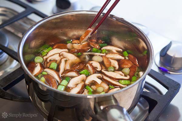 Egg drop soup stock vegetables in pot
