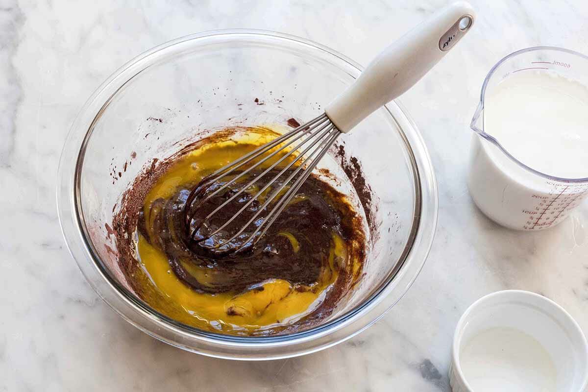 Chocolate Pudding in the Microwave whisking the ingredients