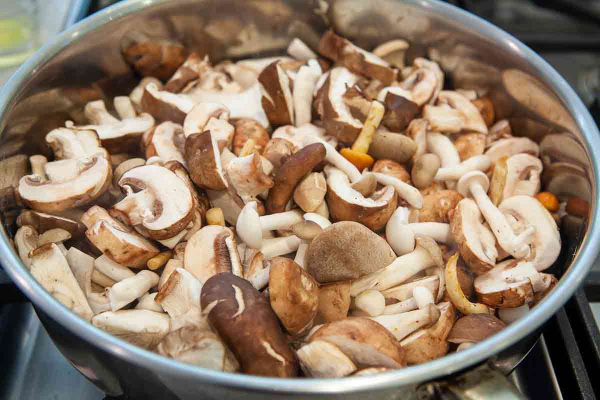 mushrooms being dry sautéed in skillet