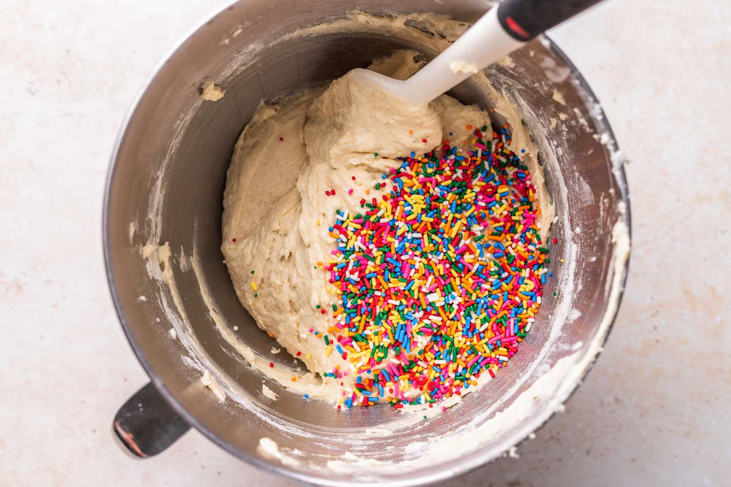 Sprinkles Added to Unicorn Cake Batter 