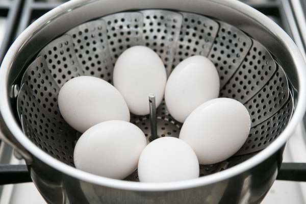 Eggs in a Steamer Basket for Hard Boiling