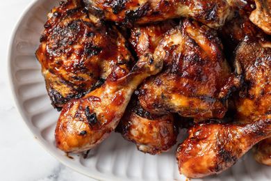 bbq chicken on a white plate