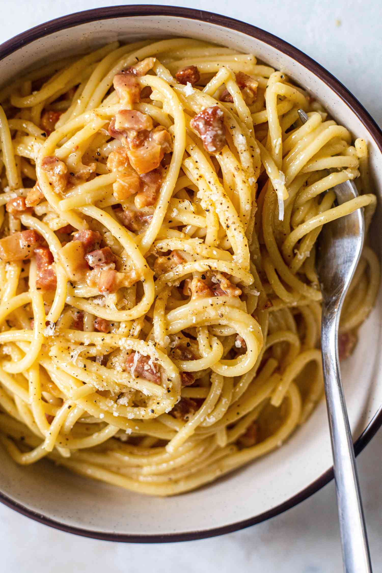 Overhead view of a bowl of Spaghetti Carbonara.