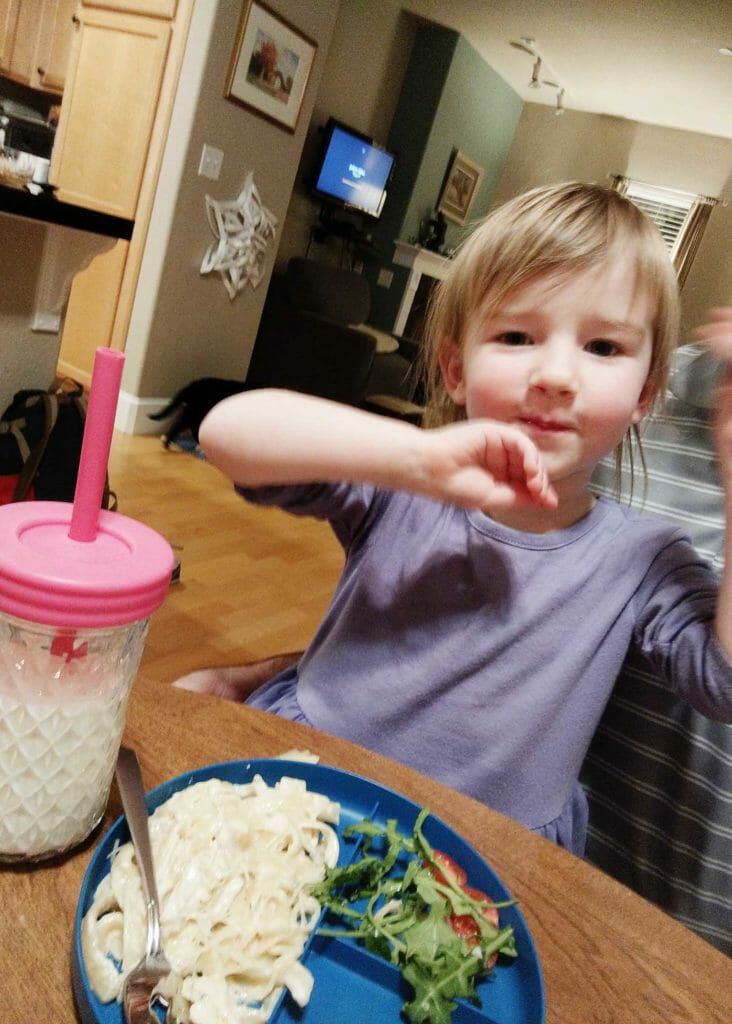 Kid eating dinner